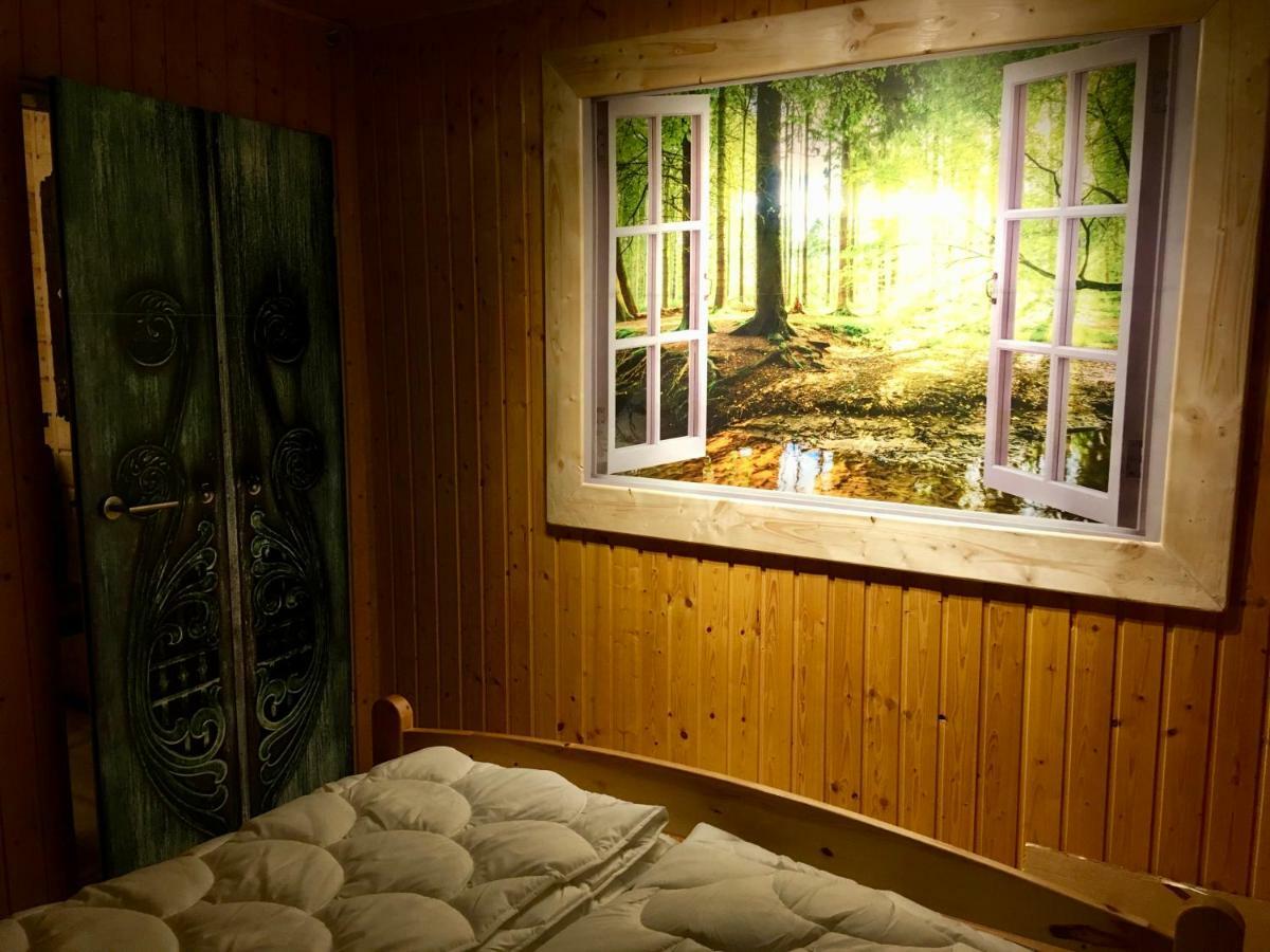 Holzhaus Trollbluemchen Am Wald Und See 诺伊鲁平 外观 照片